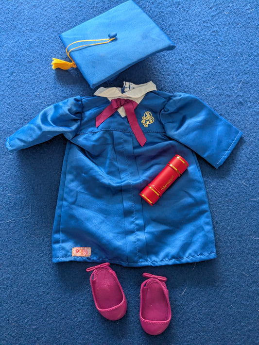 Blue children's outfit with accessories on a blue background