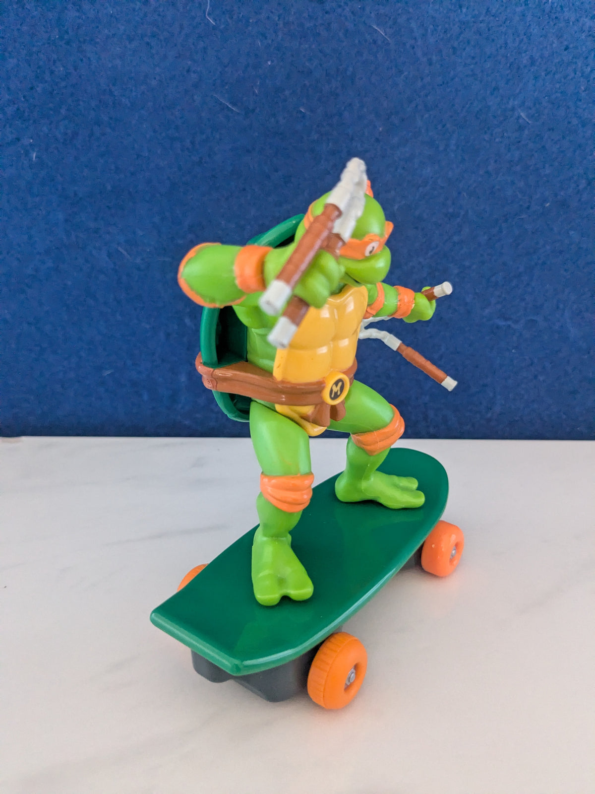 TMNT Sewer Shredders Michaelangelo 5" Pull Back Skate Toy