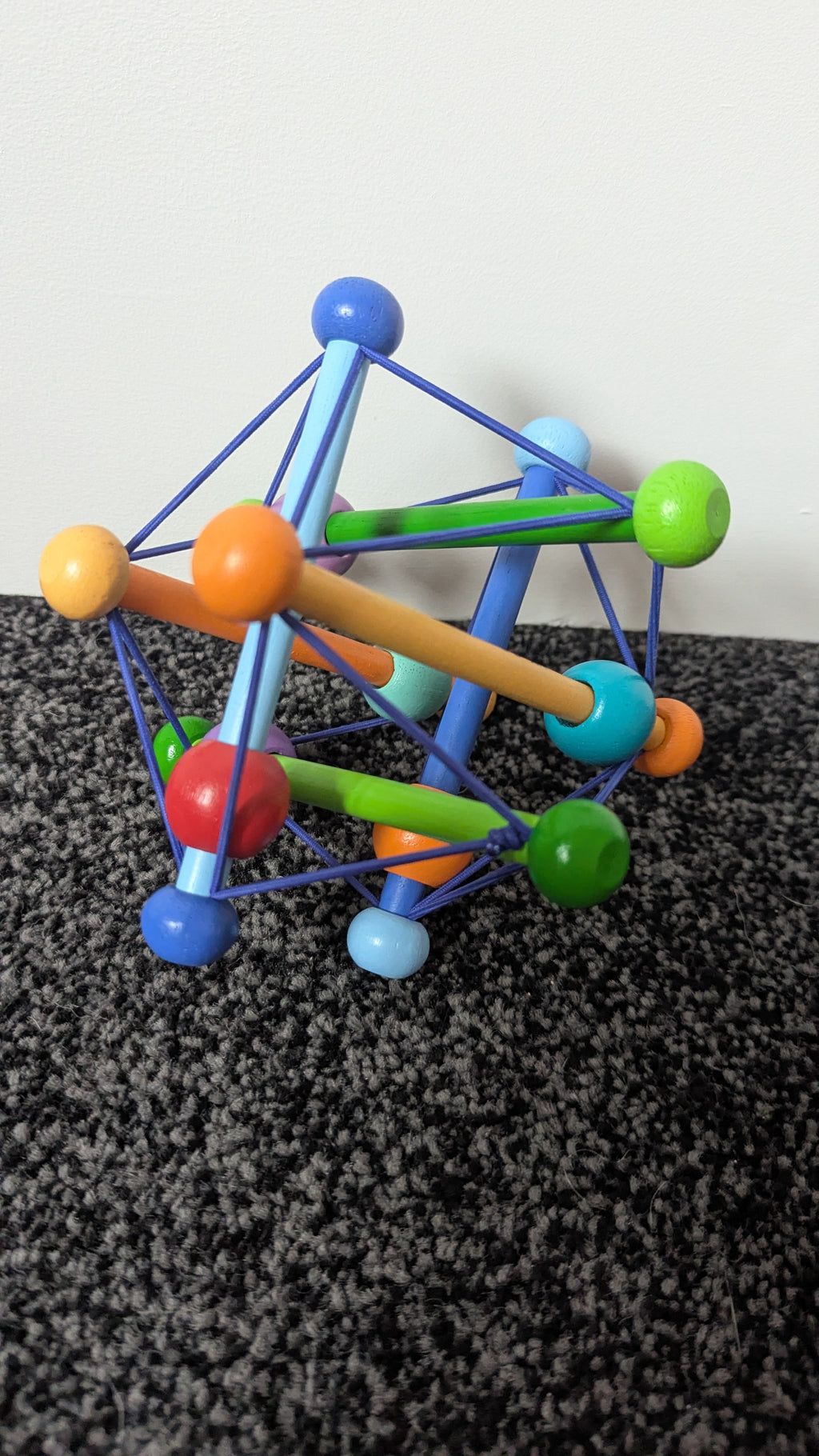 Skwish Colour Burst Wooden Rattle & Grasping Activity Toy