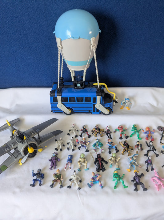 Fortnite Battle Royale Collectible Mini Figures Bundle, Deluxe Battle Bus & X-4 Stormwing Plane