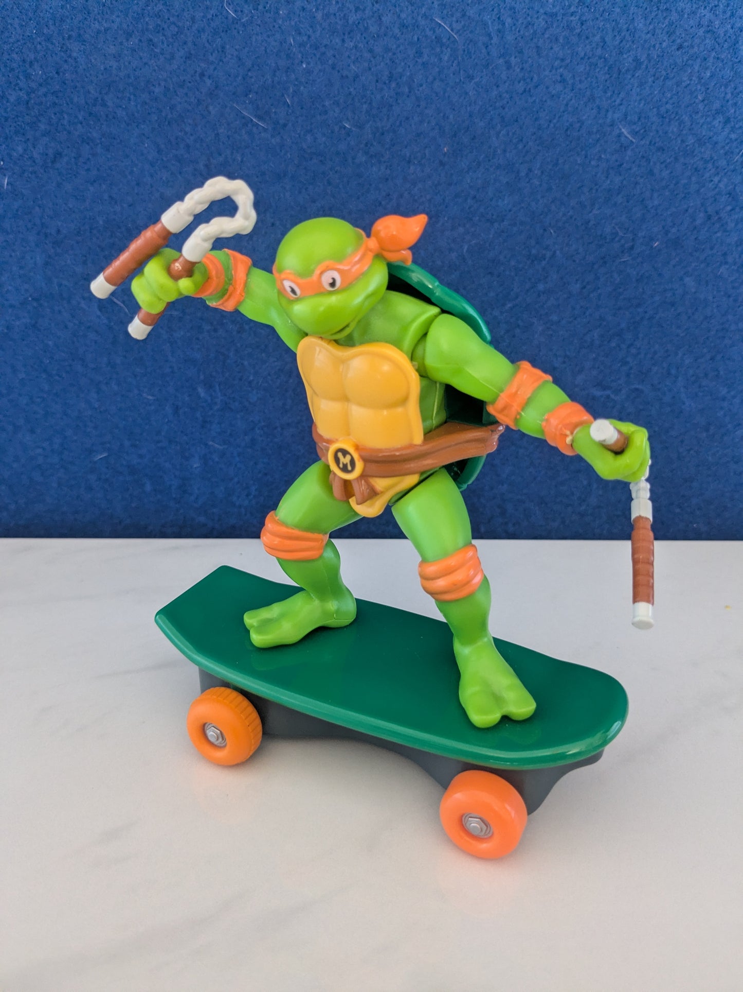 TMNT Sewer Shredders Michaelangelo 5" Pull Back Skate Toy