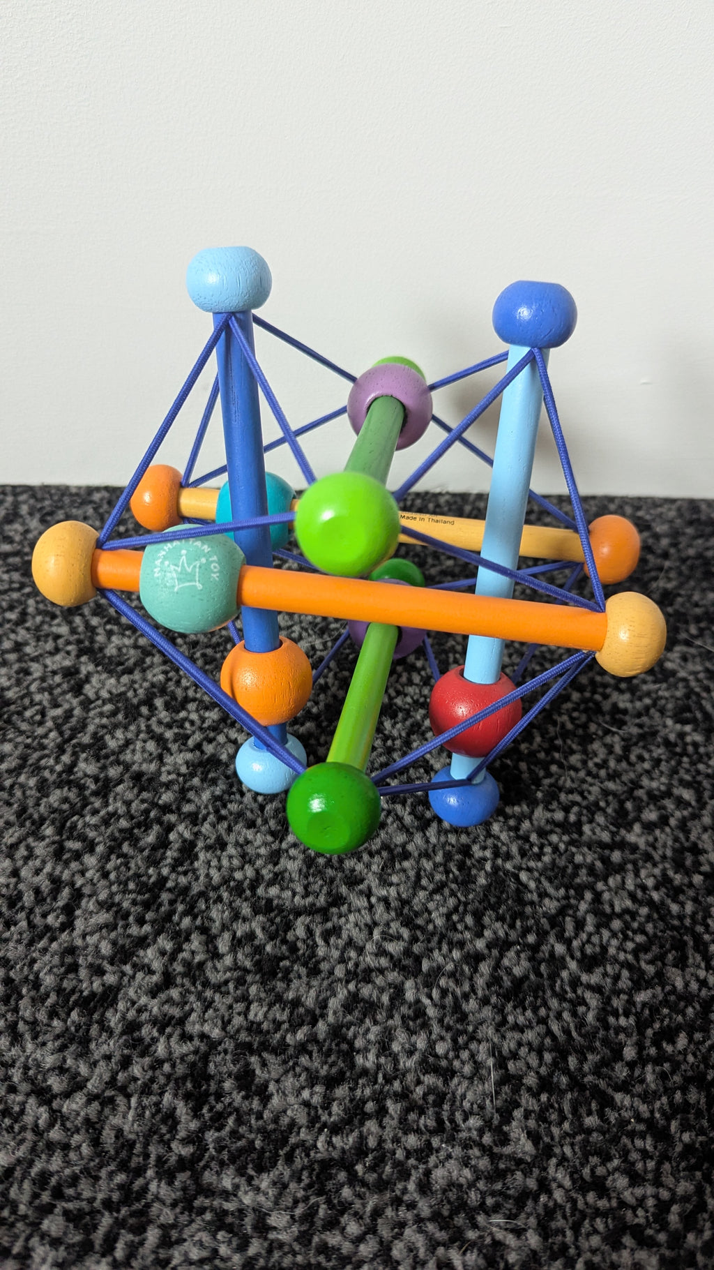 Skwish Colour Burst Wooden Rattle & Grasping Activity Toy