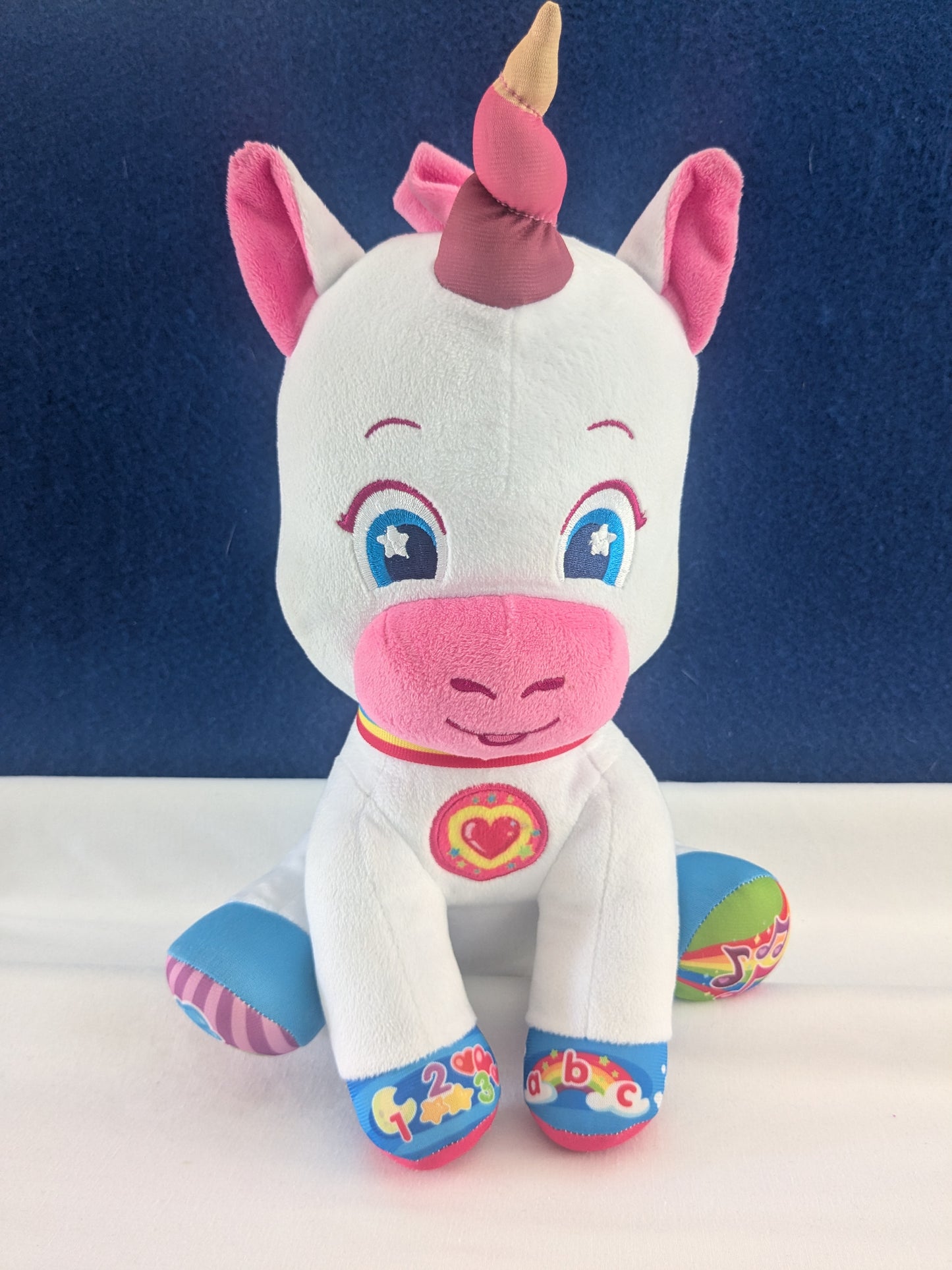 Clementoni 61293 Baby Unicorn Interactive Plush